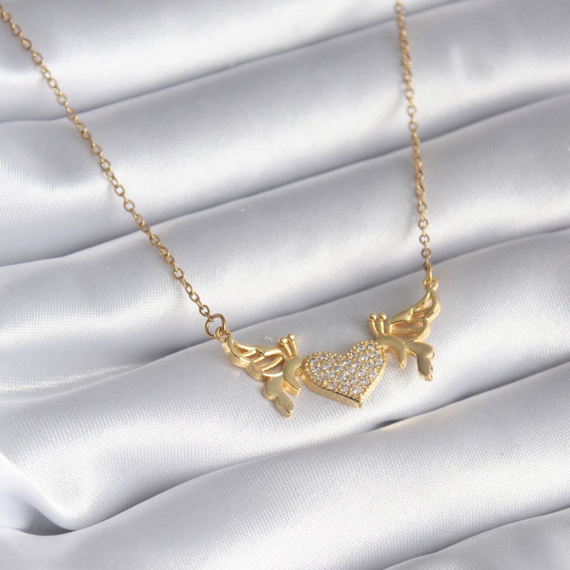 316L Çelik Gold Renk Zirkon Taşlı Kanatlı Kalp Model Kadın Kolye 316L Çelik Gold Renk Zirkon Taşlı Kanatlı Kalp Model Kadın Kolye