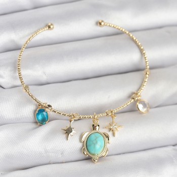 Caretta Caretta Charmlı Gold Renk Kadın Bileklik Caretta Caretta Charmlı Gold Renk Kadın Bileklik