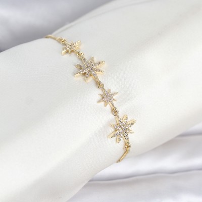 Gold Renk Pirinç Zirkon Taşlı Kutup Yıldızı Model Asansörlü Kadın Bileklik Gold Renk Pirinç Zirkon Taşlı Kutup Yıldızı Model Asansörlü Kadın Bileklik