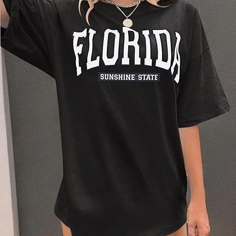Kadın Kısa Kol Yazlık Tişört Bisiklet Yaka FLORIDA Baskılı T-Shirt - Siyah Kadın Kısa Kol Yazlık Tişört Bisiklet Yaka FLORIDA Baskılı T-Shirt - Siyah