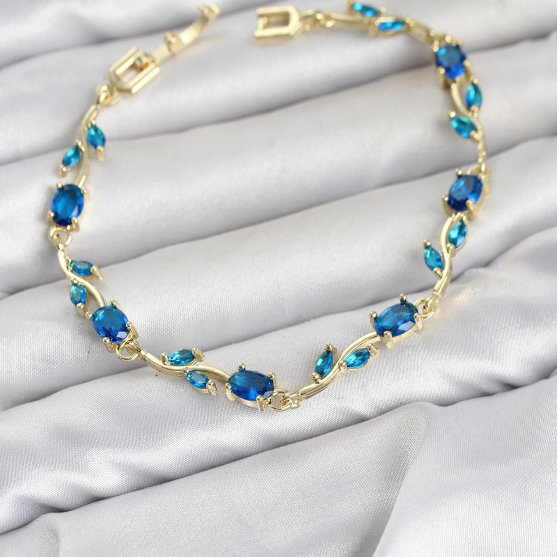 Pirinç Gold Renk Mavi Zirkon Taşlı Çiçek Model Kadın Bileklik Pirinç Gold Renk Mavi Zirkon Taşlı Çiçek Model Kadın Bileklik