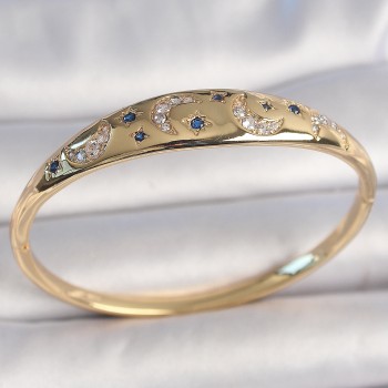 Pirinç Gold Renk Zirkon Taşlı Hilal İşleme Mavi Taşlı Yıldız Detay Kadın Kelepçe Pirinç Gold Renk Zirkon Taşlı Hilal İşleme Mavi Taşlı Yıldız Detay Kadın Kelepçe