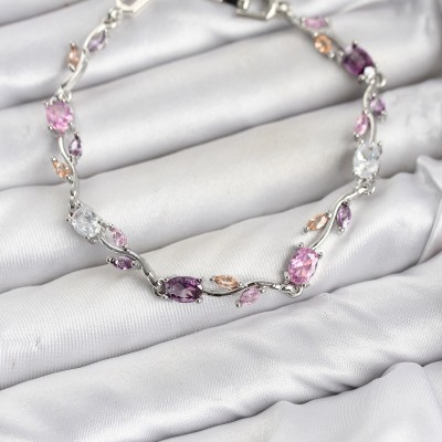 Pirinç Gümüş Renk Pembe ve Mor Zirkon Taşlı Çiçek Model Kadın Bileklik