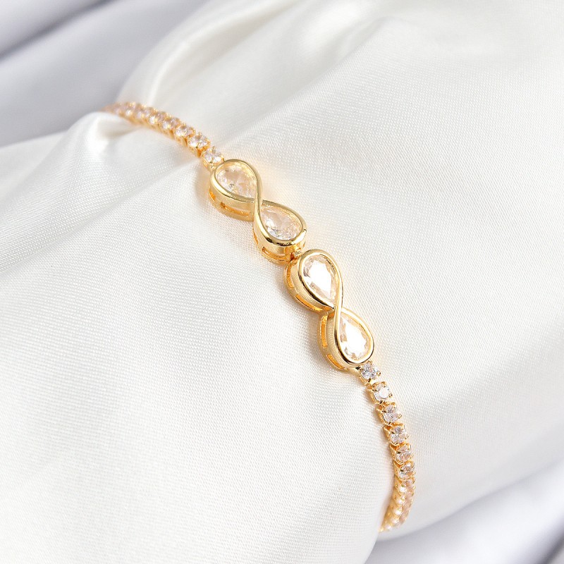 Pirinç Zirkon Taşlı Sonsuzluk Model Gold Renk Asansörlü Kadın Bileklik Pirinç Zirkon Taşlı Sonsuzluk Model Gold Renk Asansörlü Kadın Bileklik