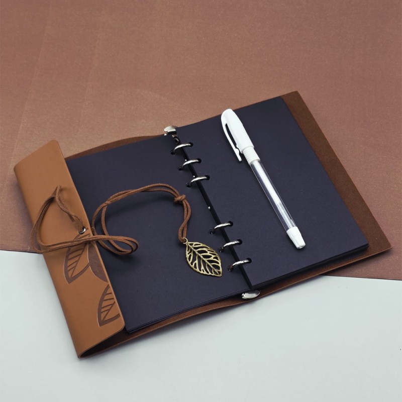 Siyah Yapraklı Deri Defter Ve Beyaz Jel Kalem Seti Siyah Yapraklı Deri Defter Ve Beyaz Jel Kalem Seti
